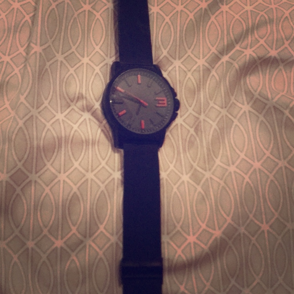 Black steel mesh watch.